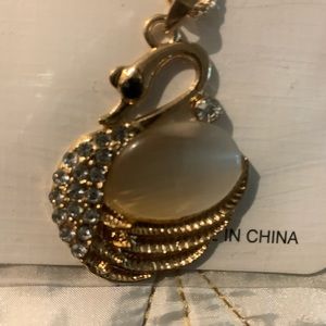 16” chain  with  a golden swan